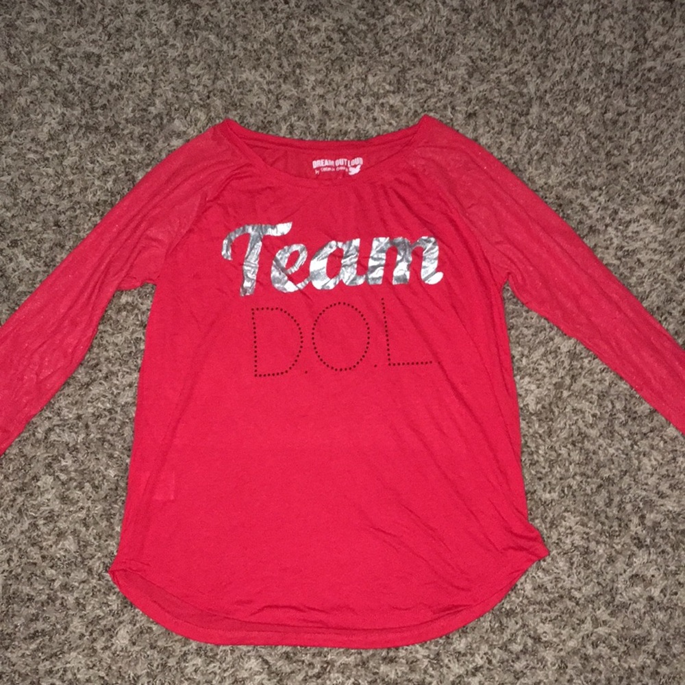 Long sleeve, thin shirt. Fits like a medium